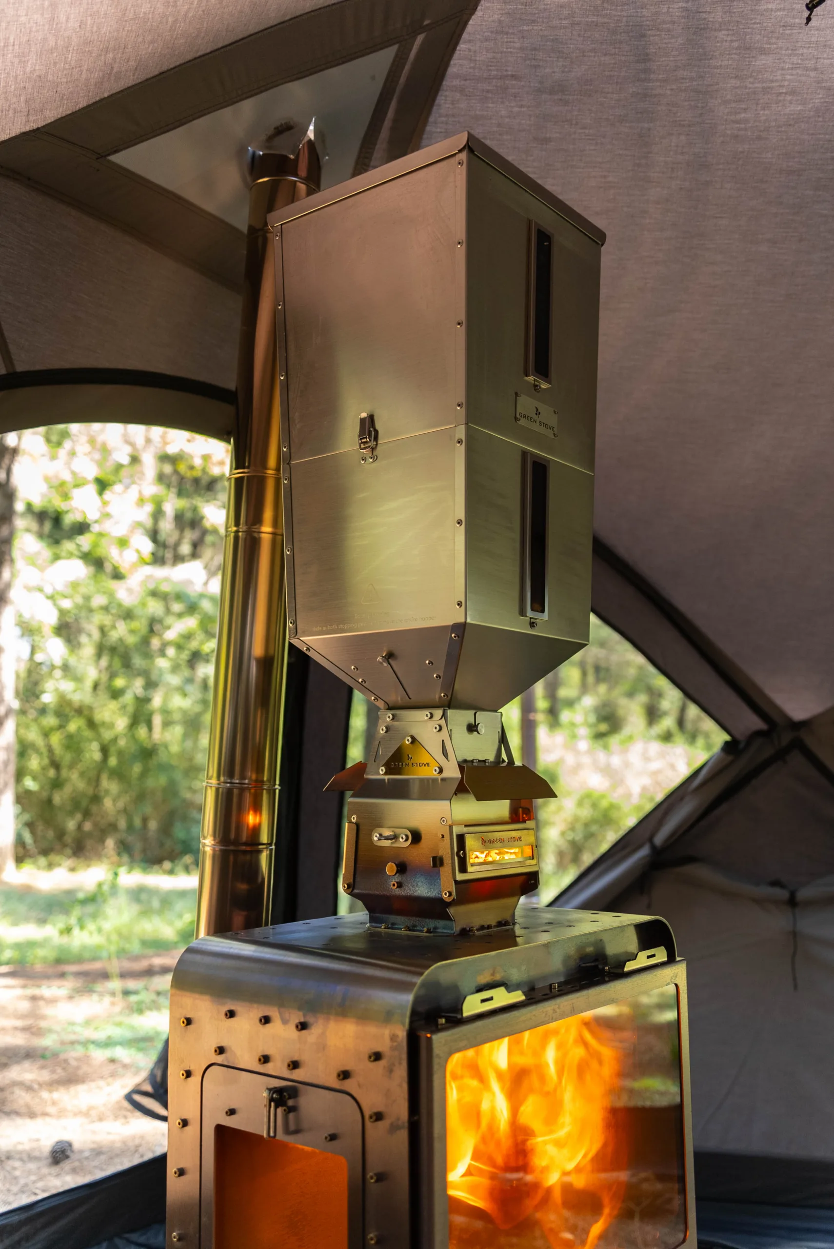 GreenEngine 3.0 Pro pellet burner and two-piece hopper installed on a large wood stove