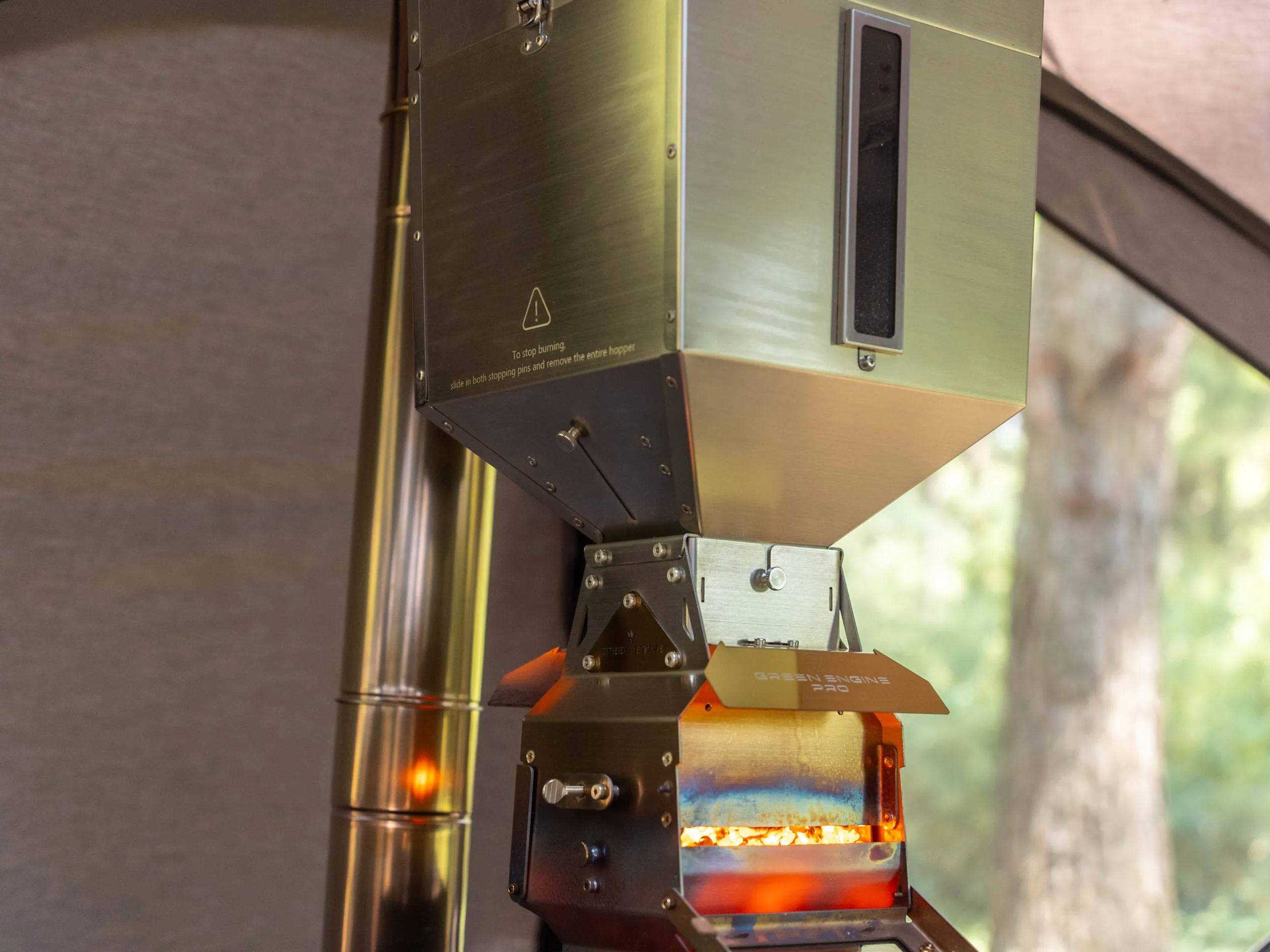 Close-up of GreenEngine 3.0 Pro burner controls and nesting hopper